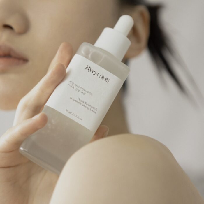 Bottle of Niacinamide Heartleaf Calming Serum with botanical ingredients.